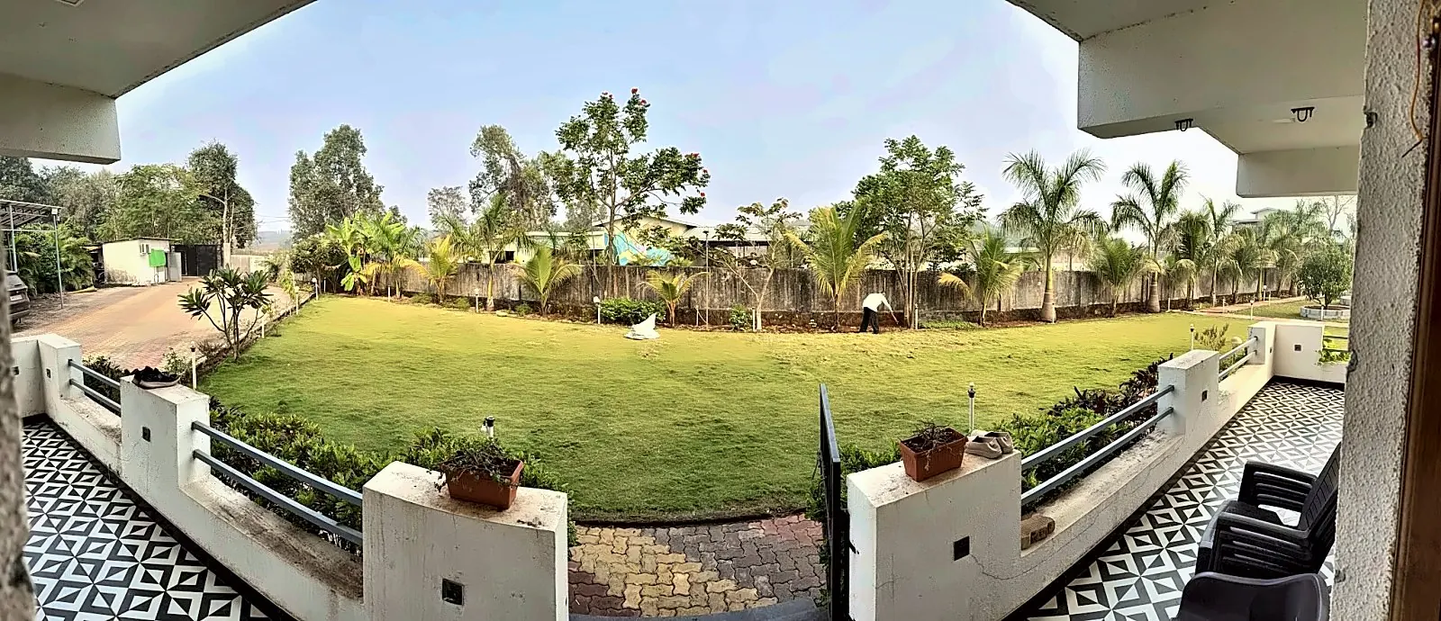 The lawn from the terrace, Aamantara Villa, Karjat