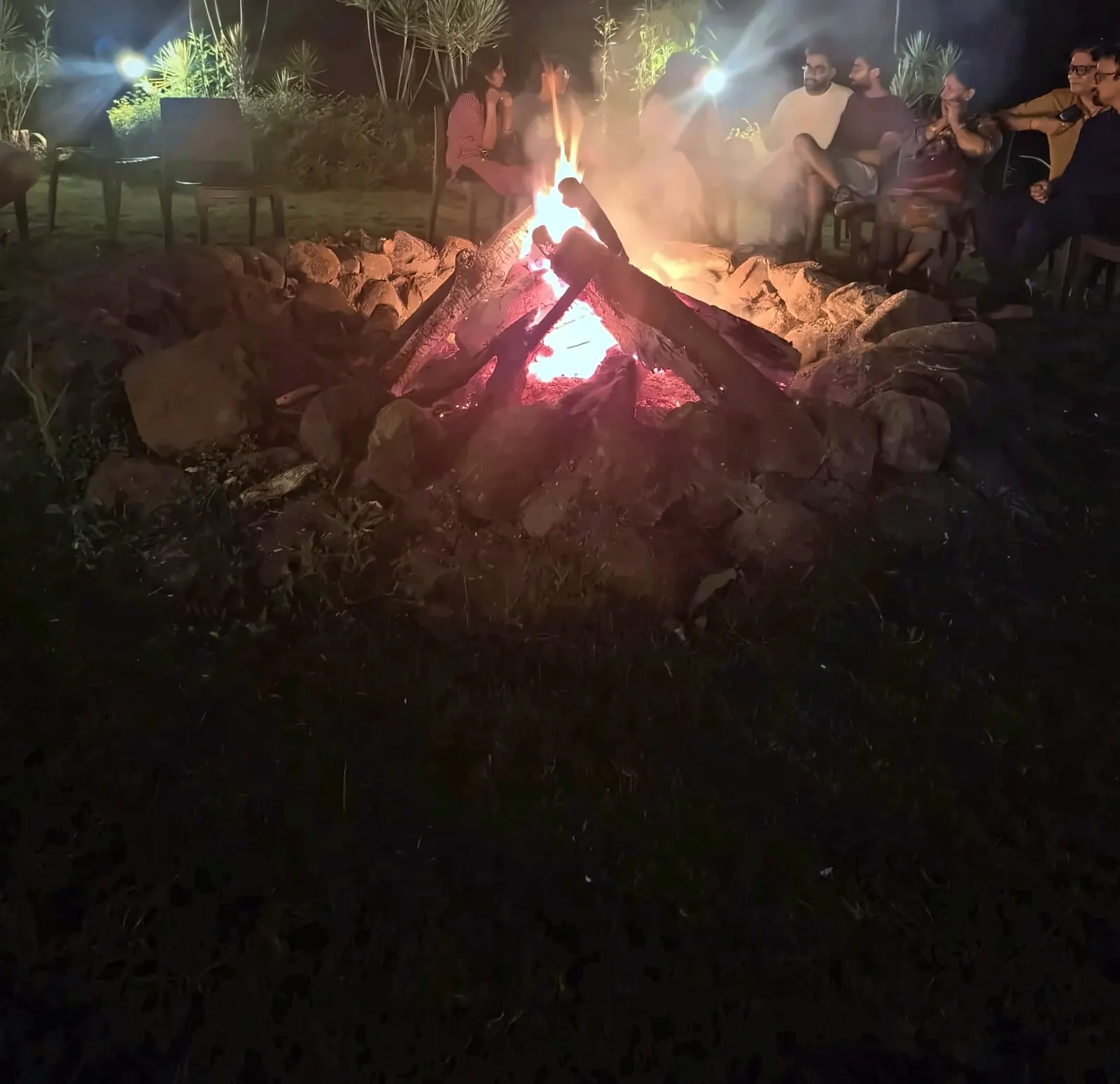 A bonfire on the lawn, Aamantara Villa, Karjat